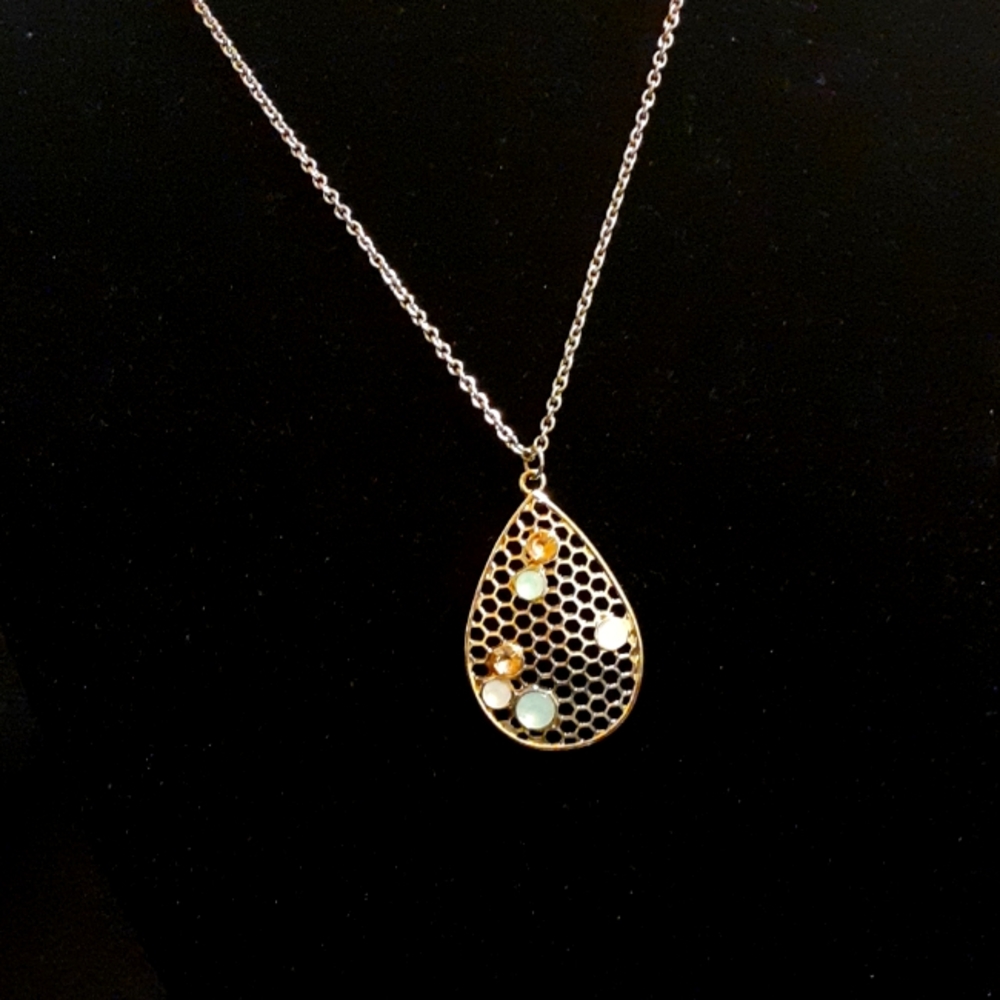 Honeycomb pendant with stones